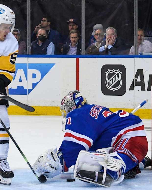 May 11, 2022; New York, New York, USA; New York Rangers goaltender Igor Shesterkin (31) makes a save on Pittsburgh Penguins left wing Jake Guentzel (59) during the third period in game five of the first round of the 2022 Stanley Cup Playoffs at Madison Square Garden. Mandatory Credit: Dennis Schneidler-USA TODAY Sports